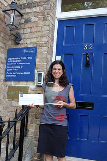 Lucie Cluver with her ESRC Outstanding International Impact award Lucie Cluver with her ESRC Outstanding International Impact award