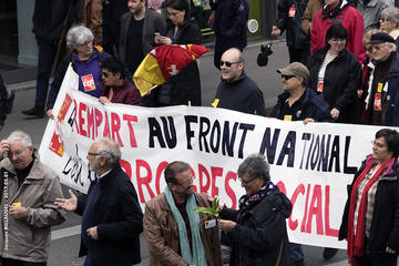 A group of people protesting Front National 