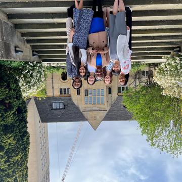 A group photo of the SERSPI organising committee on the steps of Nuffield College, Oxford