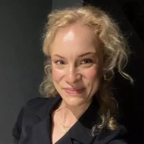 Alicja Borzyszkowska wears a dark-coloured blazer and has blonde hair.