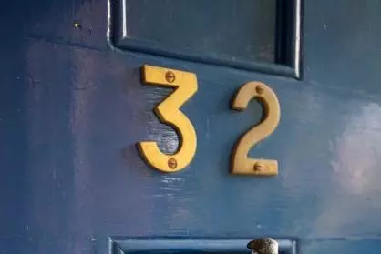 Blue front door at Barnett House, 32 Wellington Square, Oxford