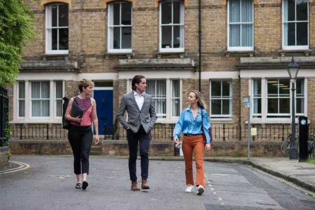 DSPI students walking along the street near to Barnett House